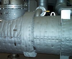 Dämmmatratzen an einem Abgaswärmetauscher zur Wärmedämmung